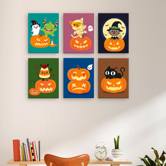 Gatti e zucche di Halloween